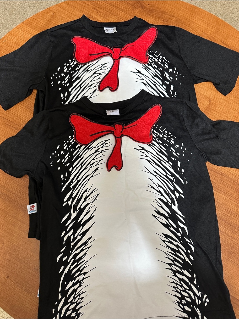 Dr. Seuss Black Tee with White Belly Graphic and Red Bow